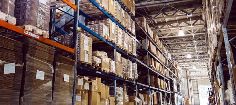full shelves in an industrial warehouse